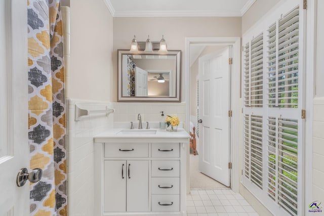 4871 Oxford Rd, Macon, GA 31210 - full bathroom featuring vanity, tile walls, ornamental molding, tile patterned flooring, and curtained shower