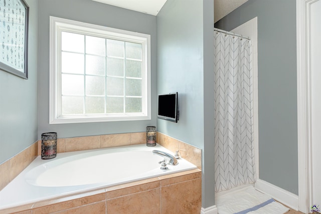 413 Madison Place Parkway, Byron, GA 31008 - full bath featuring a bath and curtained shower