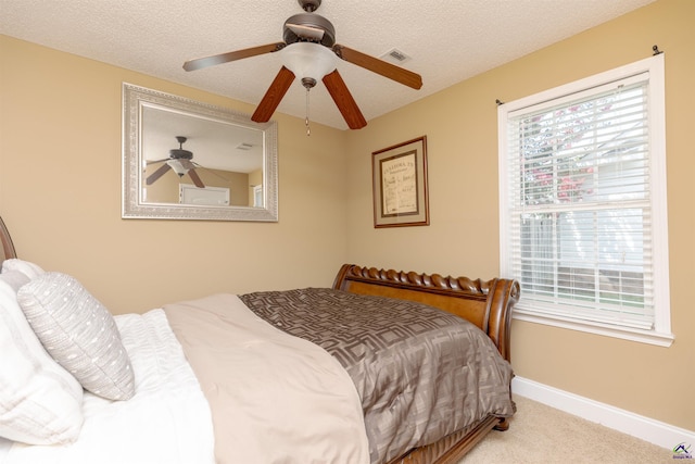 413 Madison Place Parkway, Byron, GA 31008 - bedroom with carpet flooring, a textured ceiling, and ceiling fan