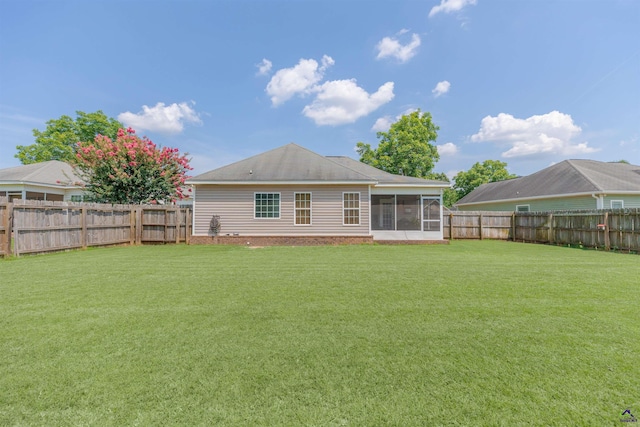 413 Madison Place Parkway, Byron, GA 31008 - rear view of property featuring a sunroom and a fenced backyard