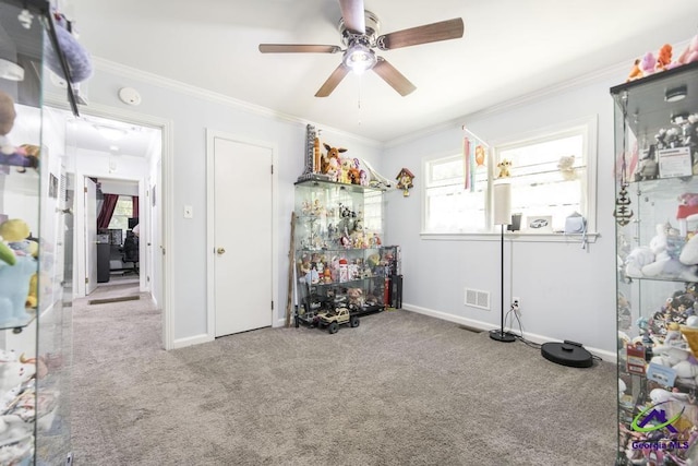 2740 Riverview Rd, Macon, GA 31204 - misc room featuring crown molding, a ceiling fan, and carpet