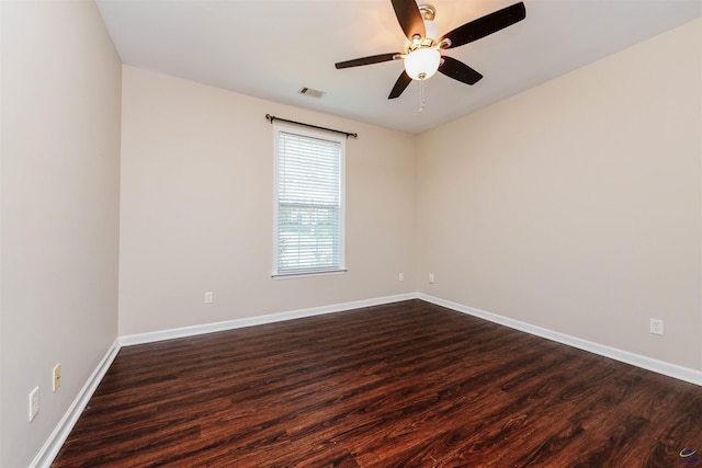 202 Stafford Beach Dr, Byron, GA 31008 - spare room with dark wood-style floors and ceiling fan