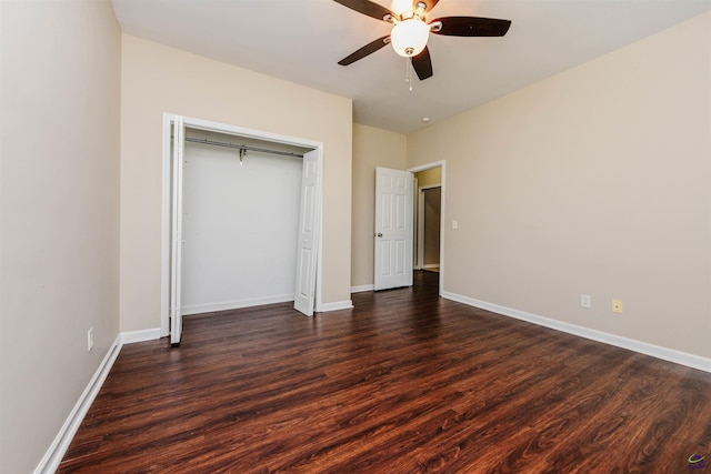 202 Stafford Beach Dr, Byron, GA 31008 - unfurnished bedroom featuring dark wood-style flooring, a ceiling fan, and a closet