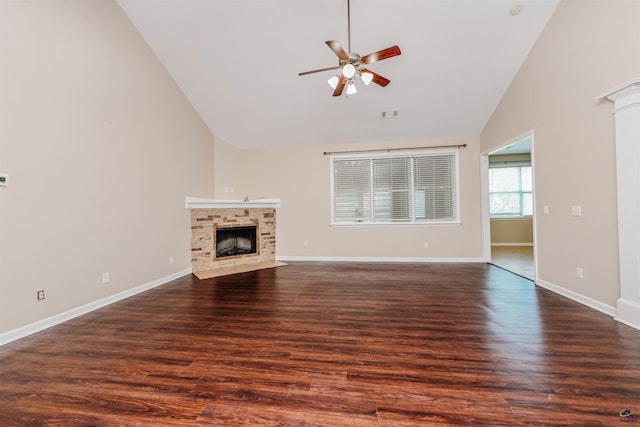 202 Stafford Beach Dr, Byron, GA 31008 - unfurnished living room with ceiling fan, high vaulted ceiling, a fireplace with flush hearth, and dark wood-style floors