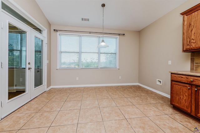 202 Stafford Beach Dr, Byron, GA 31008 - unfurnished dining area featuring baseboards and light tile patterned floors