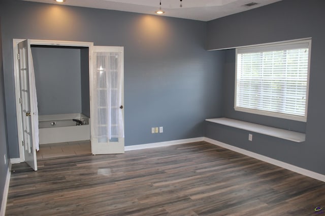 125 Buckskin Trl, Byron, GA 31008 - unfurnished bedroom featuring wood finished floors and recessed lighting