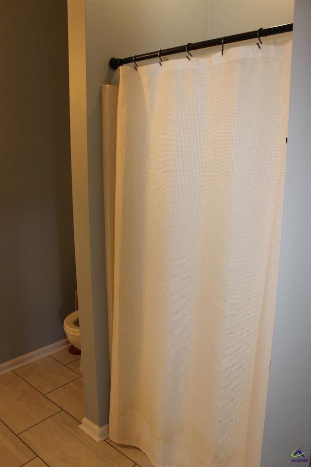 125 Buckskin Trl, Byron, GA 31008 - full bathroom featuring toilet and tile patterned flooring