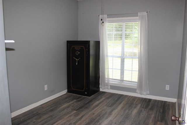 125 Buckskin Trl, Byron, GA 31008 - spare room with dark wood-type flooring
