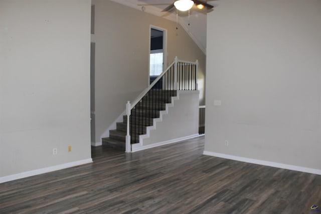 125 Buckskin Trl, Byron, GA 31008 - unfurnished living room featuring ceiling fan, dark wood finished floors, stairway, and vaulted ceiling