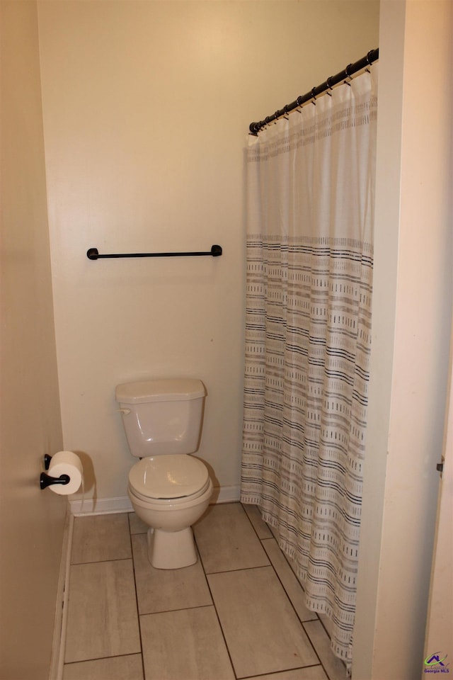 125 Buckskin Trl, Byron, GA 31008 - full bath with tile patterned flooring and curtained shower