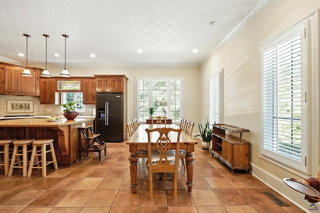 228 Lagrange Ct, Macon, GA 31210 - dining area featuring healthy amount of natural light, ornamental molding, and recessed lighting