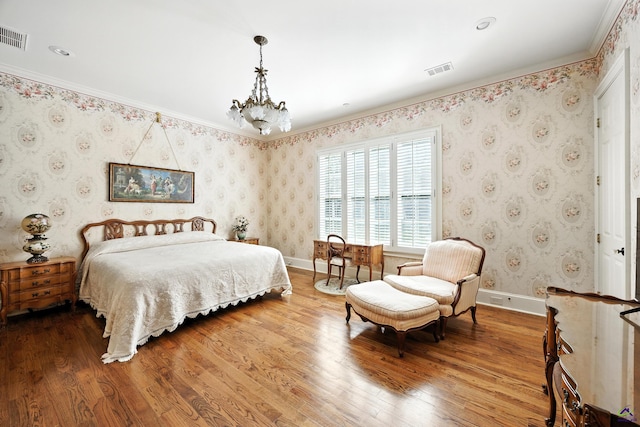 228 Lagrange Ct, Macon, GA 31210 - bedroom featuring wood finished floors, crown molding, and a chandelier