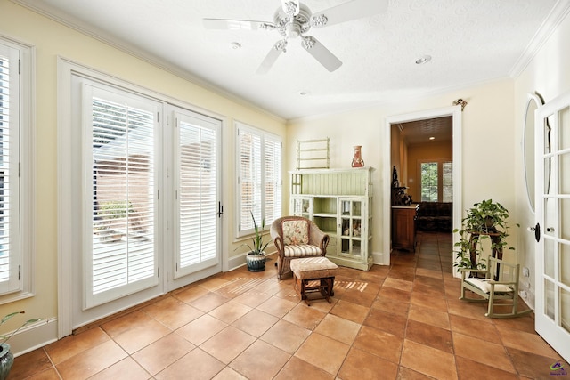 228 Lagrange Ct, Macon, GA 31210 - living area featuring a ceiling fan, ornamental molding, and light tile patterned floors