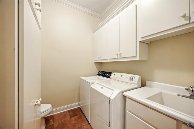 228 Lagrange Ct, Macon, GA 31210 - laundry area with independent washer and dryer, ornamental molding, and dark tile patterned floors