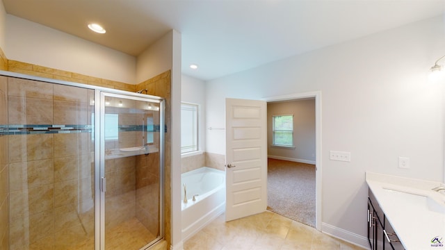 452 Southern Oaks Dr, Macon, GA 31216 - full bathroom with vanity, a garden tub, a shower stall, tile patterned floors, and recessed lighting