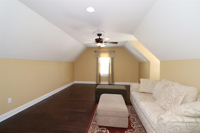 bonus room featuring dark hardwood / wood-style floors, ceiling fan, and vaulted ceiling