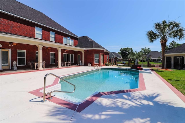 view of swimming pool featuring a patio area