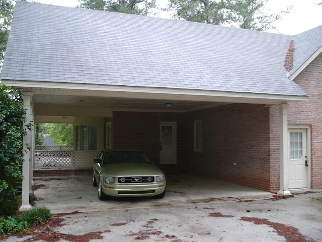 garage featuring a carport