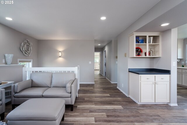2131 Beach Loop Dr, Bandon, OR 97411 - living room featuring recessed lighting, wood finished floors, and baseboards