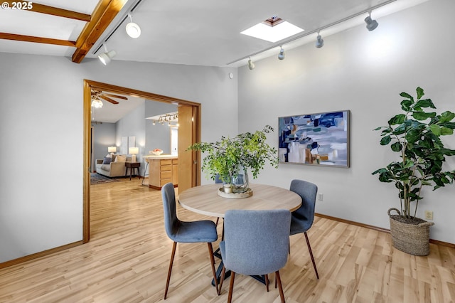 602 SE 130th Ct, Vancouver, WA 98683 - dining room featuring track lighting, light wood-style flooring, and baseboards