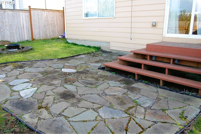 view of patio featuring fence