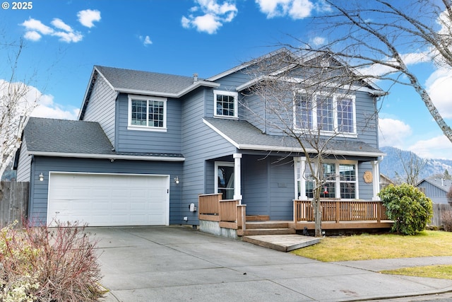 front of property with a garage