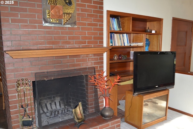 living room featuring a fireplace