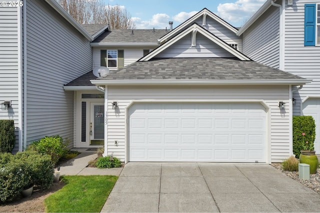 1705 SE 111th Ct, Vancouver, WA 98664 - view of front facade featuring concrete driveway, a shingled roof, and a garage