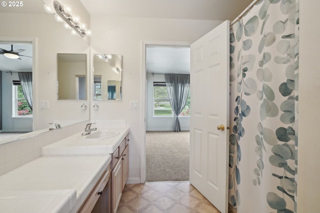 1705 SE 111th Ct, Vancouver, WA 98664 - full bathroom with a ceiling fan, tile patterned floors, vanity, curtained shower, and baseboards