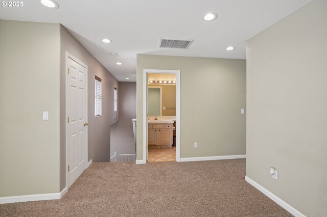 1705 SE 111th Ct, Vancouver, WA 98664 - interior space with recessed lighting, visible vents, a sink, baseboards, and light colored carpet