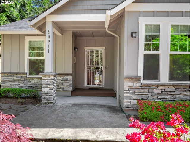 64911 E Mountain Meadow Ln, Rhododendron, OR 97049 - property entrance with stone siding and board and batten siding