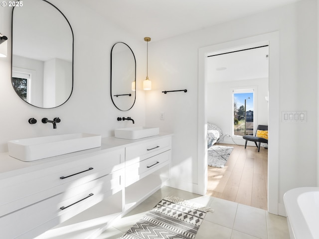 bathroom featuring vanity and tile patterned flooring