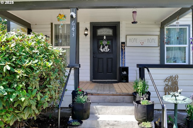 doorway to property with a porch