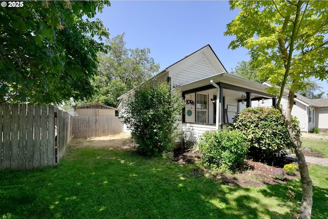 exterior space with a lawn