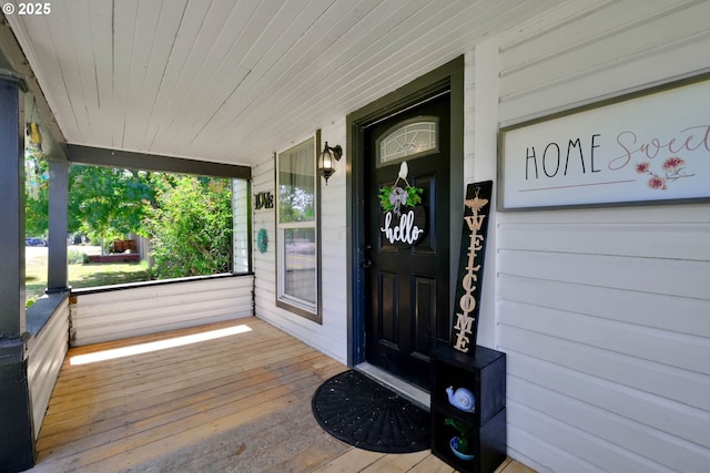 doorway to property with covered porch