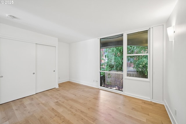 668 Mcvey Ave Unit 83, Lake Oswego, OR 97034 - unfurnished bedroom with light wood-type flooring and a closet