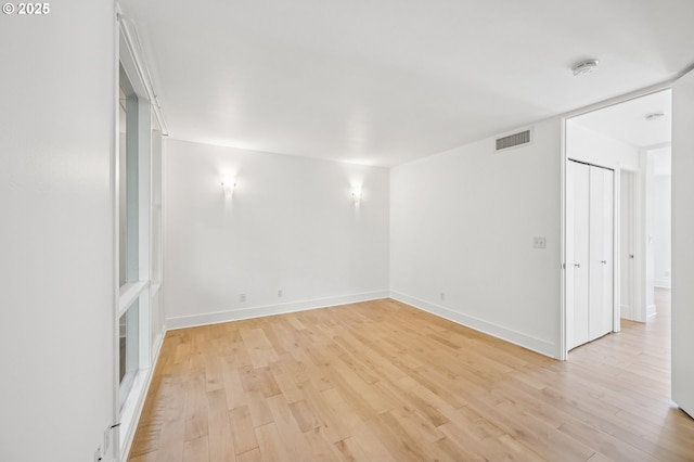 668 Mcvey Ave Unit 83, Lake Oswego, OR 97034 - empty room featuring light wood finished floors and a smoke detector