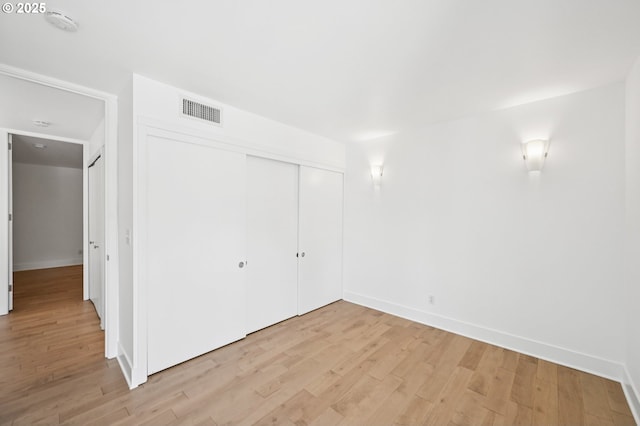 668 Mcvey Ave Unit 83, Lake Oswego, OR 97034 - unfurnished bedroom featuring light wood-style floors and a closet