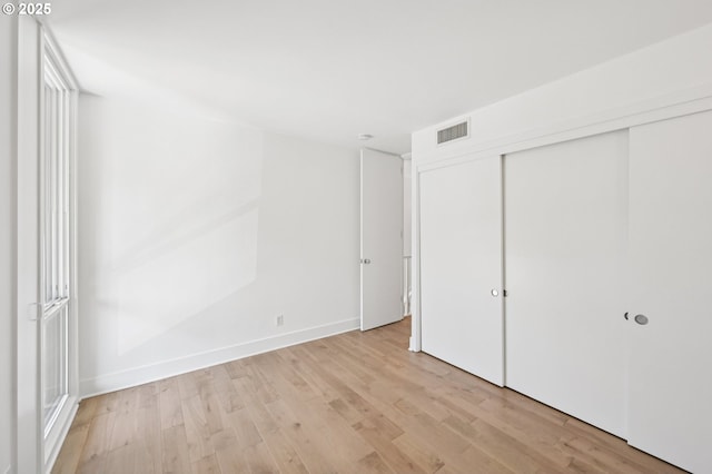 668 Mcvey Ave Unit 83, Lake Oswego, OR 97034 - unfurnished bedroom featuring light wood-style flooring and a closet