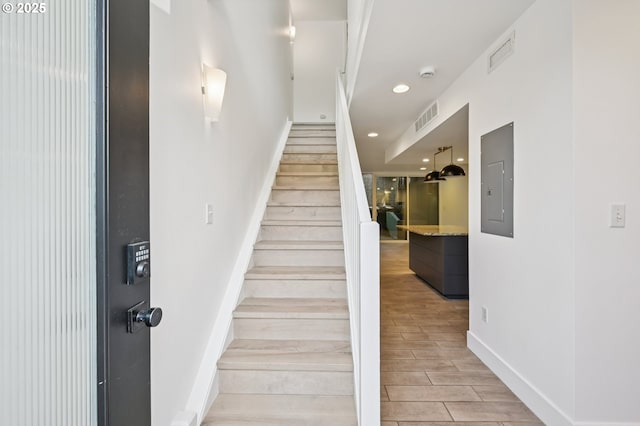 668 Mcvey Ave Unit 83, Lake Oswego, OR 97034 - stairway with electric panel, wood finished floors, and recessed lighting