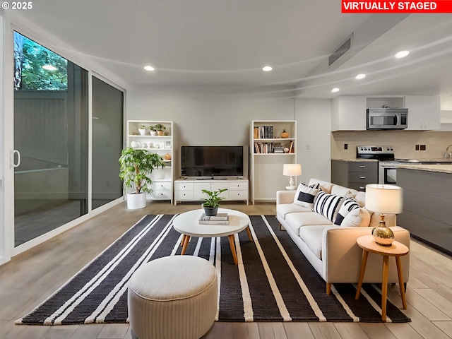 668 Mcvey Ave Unit 83, Lake Oswego, OR 97034 - living area featuring recessed lighting and wood finished floors