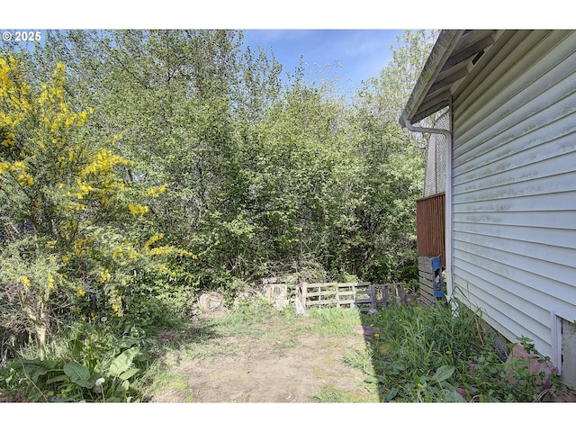 view of yard featuring fence