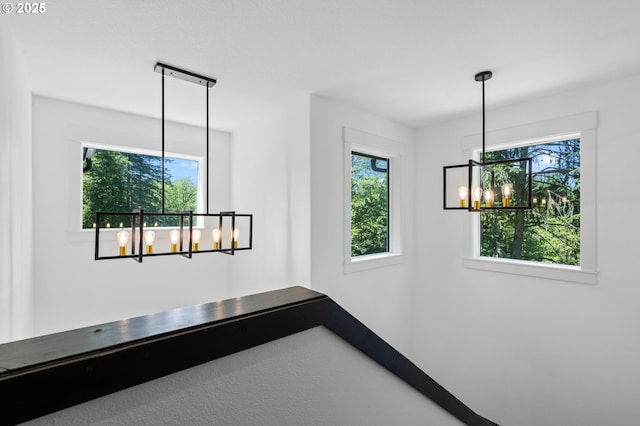 28009 NE Thompson Cir, Yacolt, WA 98675 - spare room featuring a chandelier