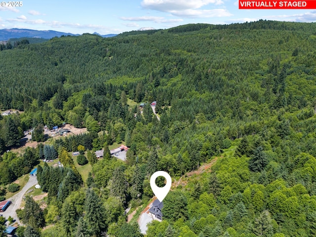 28009 NE Thompson Cir, Yacolt, WA 98675 - aerial view of property and surrounding area featuring a forest and a mountainous background