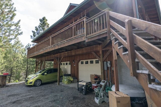 62482 Canyon Creek Ln, Canyon City, OR 97820 - view of property exterior featuring an attached garage and gravel driveway