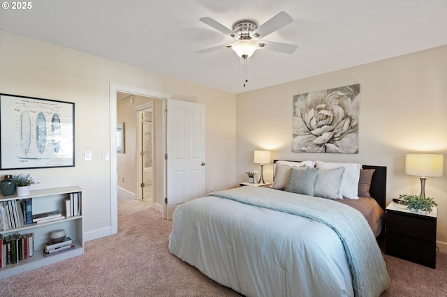 carpeted bedroom featuring baseboards and ceiling fan