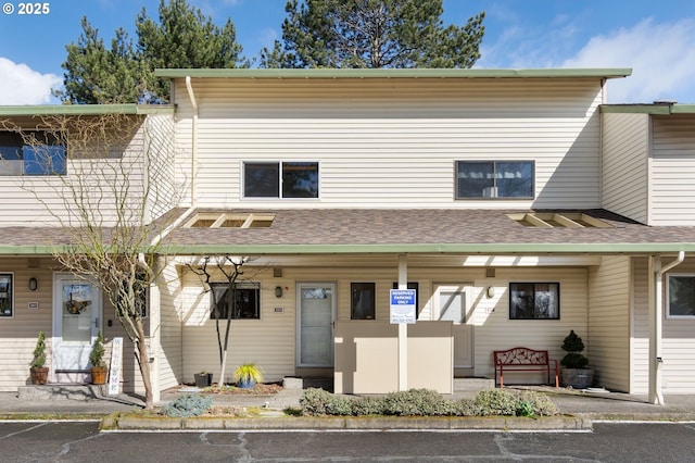 view of property featuring a porch