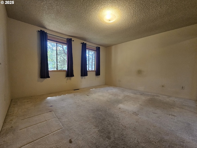 710 E Quince Ave, Hermiston, OR 97838 - spare room featuring carpet and a textured ceiling