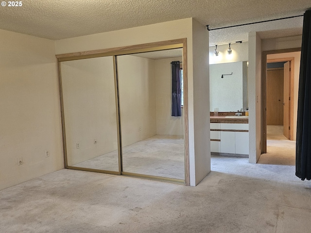 710 E Quince Ave, Hermiston, OR 97838 - carpeted spare room with a textured ceiling