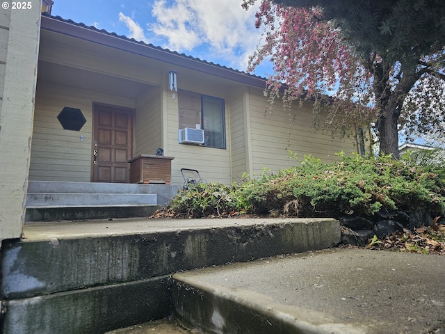 710 E Quince Ave, Hermiston, OR 97838 - view of exterior entry with metal roof and cooling unit